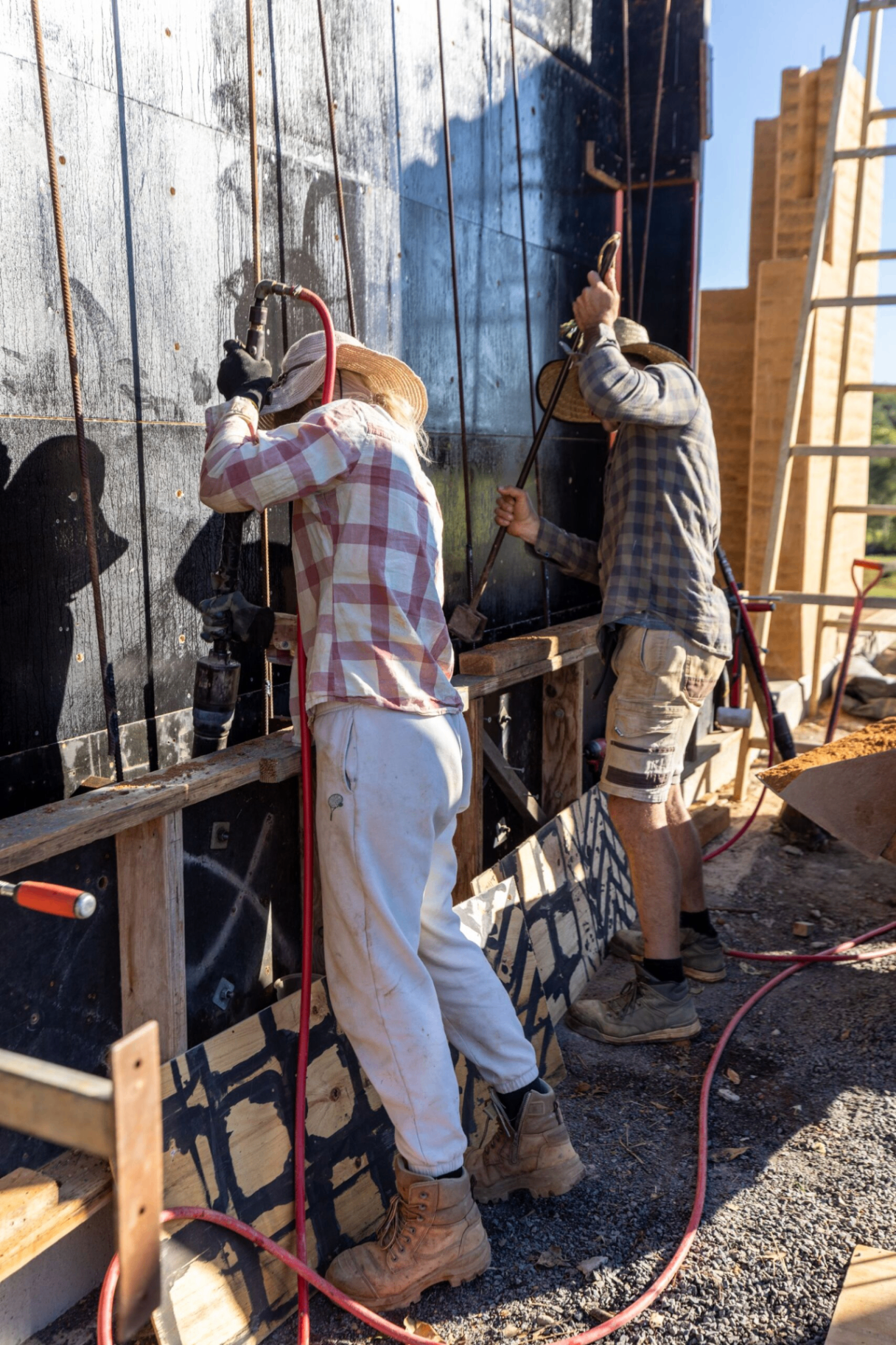 Builders working the formwork