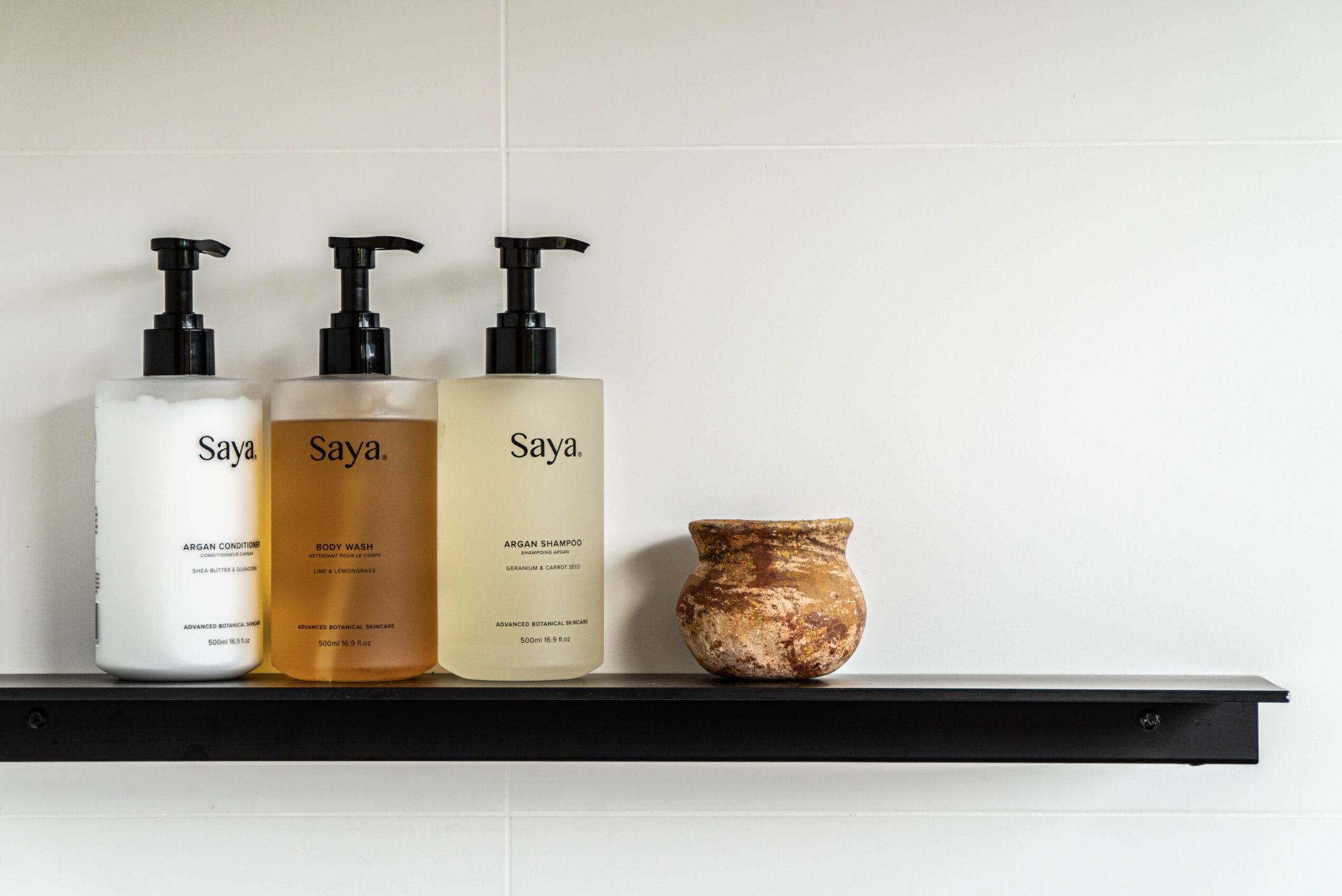 Saya bath amenities on a shelf